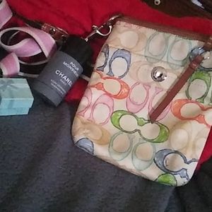 A colorful coach bag.